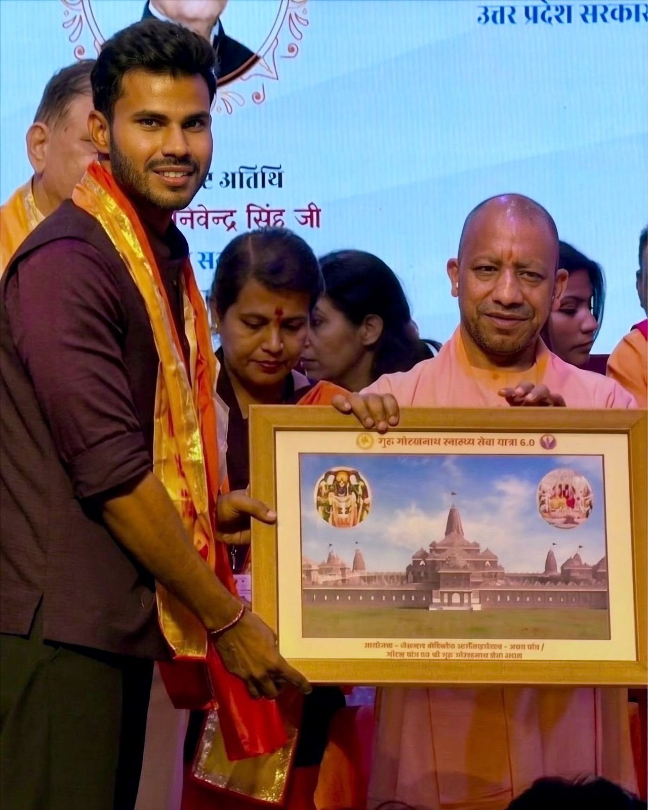 Presenting the sacred Shri Ram Janmabhoomi Pujit Akshat to Hon'ble CM Shri Yogi Adityanath Ji